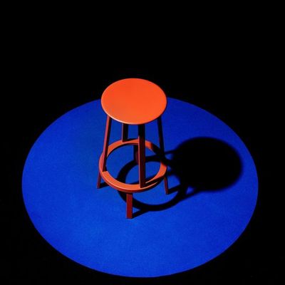 Orange Stool on Blue Circle