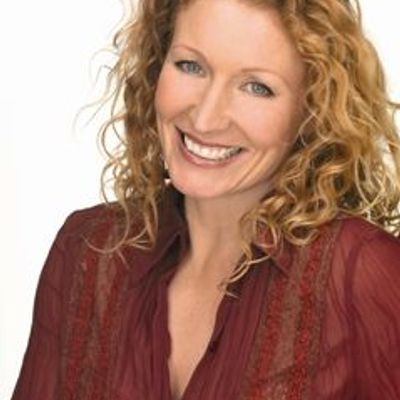 Curly-haired Woman Smiling