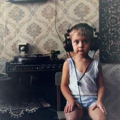 Child DJing child dj headphones turntable vintage