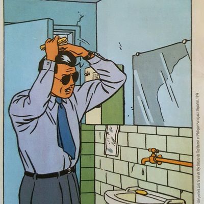Man Brushing Hair in Bathroom
