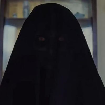 Silhouette of a hooded figure