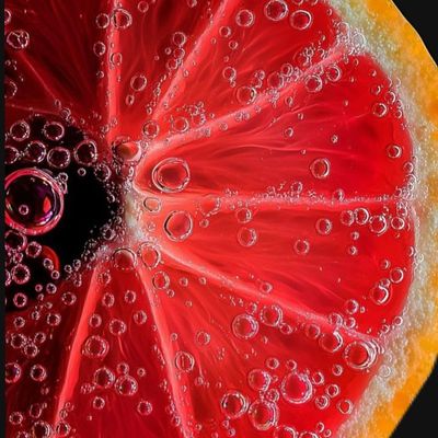 Sliced Grapefruit with Bubbles