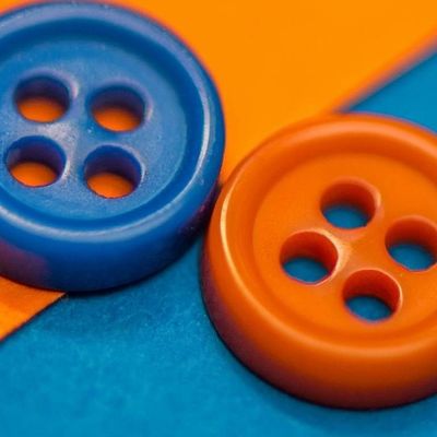 Bright Buttons on Colorful Background buttons colorful playful background vibrant