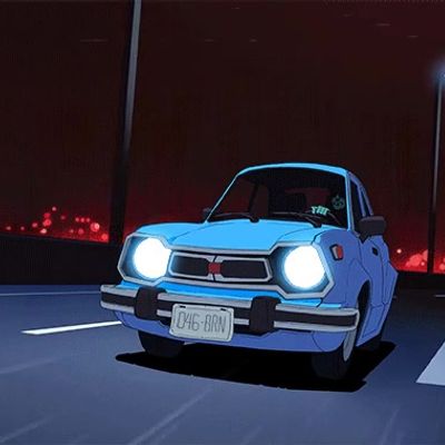 Blue Car on Road at Night