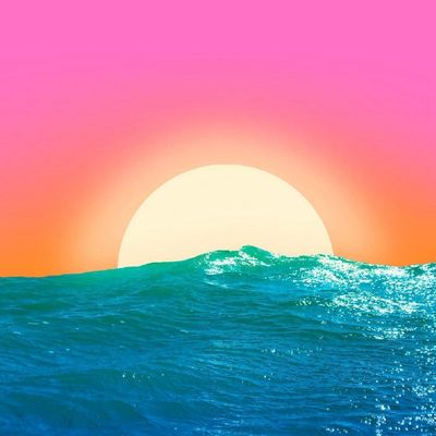 Sunset Over Ocean Waves