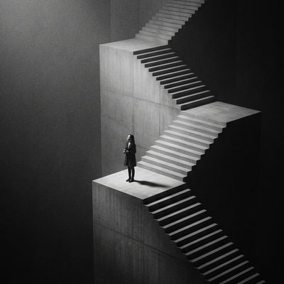 Solitary Figure Ascending Surreal Staircase