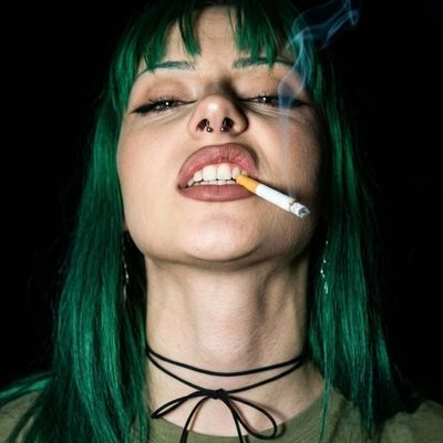 Green Haired Woman Smoking